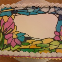 My Attempt At Stained Glass Using Buttercream I painted this stained-glass cake using buttercream. I piped on different colors of buttercream and smoothed the sections out with a small...