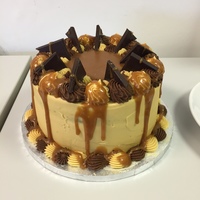 Chocolate And Salted Caramel Cake Chocolate & Salted caramel cake, salted caramel buttercream, salted caramel sauce and chocolate shards.