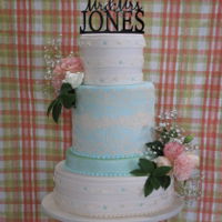 Mint,lace And Inlay Wedding Cake 4.5 layer mint ivory lace and inlay wedding cake. guest tell me not 1 slice remained.