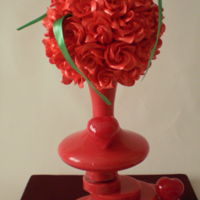 Valentineday Valentine show piece Roses made of pulledsugar. Hearts made of blown sugar. Leaves made of pulled Vase and base made of cast isomalt