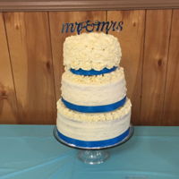 First Wedding Cake Three tiered wedding cake in 6, 8, and 10 inch layers