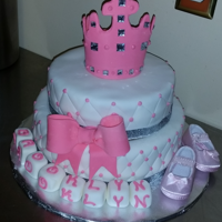 Princess Baby Shower I made this cake using a 8" & 10" with fondant. The little crown was made for fondant.