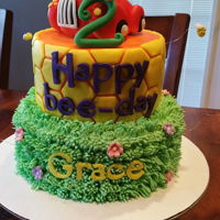 Bee Movie Cake 3-tier fondant, from the movie Bee Movie, with buzzing around bees.