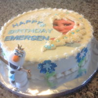 Frozen, For A Spring Birthday 12 inch cake, covered in Buttercream frosting , gumpaste Olaf and snowflakes