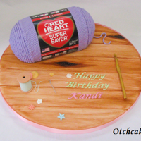 Red Heart Yarn Cake Carved cake made to look like a skein of yarn! Each string was pressed through an extruder and placed on the cake. :)