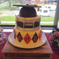 Graduation For A Drummer The diamonds around the back featured other things the graduate had participated in.