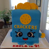 Kris P Crackers Shopkins is the theme of this birthday cake
