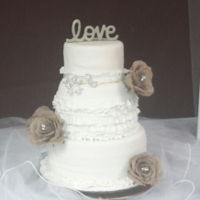 Love Wedding Cake Red Velvet Cake with cream cheese, white chocolate ganache frosting, covered in white fondant. Detailed with fondant ruffles, burlap...