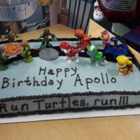 Run Turtles Run! Half Sheet Cake, vanilla cake with vanilla buttercream. Fondant pizza, manhole cover and road. Customer provided the toys for the rest of...