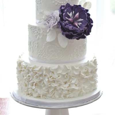 White Wedding Cake With Purple Flower