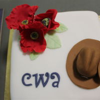 Anzac Day Cake I covered a rich fruit cake with white fondant. The red poppies I made out of out of pre coloured RTR fondant. It took me ages until I...