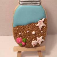 Beach In A Mason Jar Gourmet Sugar Cookie Sugar cookie with royal icing and gourmet sanding sugar.