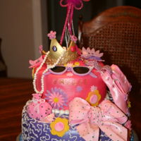 Fancy Nancy This was a two tier, 12" and an 8" with the 8" stacked towards the back side of the 12 " tier to make room for the...