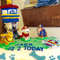 Paw Patrol Paw patrol cake make with chocolate fudge frosting and filling. Tower made of Rice Krispies and a mini cake. Cover in homemade fondant....