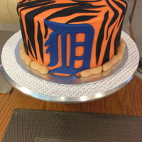 Detroit Tigers Baseball Cutting cake with matching cupcakes for an 80 year young lady's birthday!