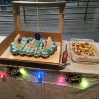 Hockey Cake For My Son First attempt at a pull apart cake. Also made some hockey stick and puck sugar cookies.