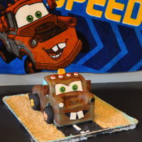 Mater Cake Mater inspired cake hand carved and covered in fondant with rice krispy treat wheels.