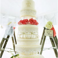 Wedding Cake This cake was 5ft 6ins all sugar. I made this for my Daughters wedding. And yes they had to use the 6ft ladders to get to the top to cut...