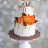 70 Years Loved A birthday cake for a 70 years old lady, a cake comissioned by her lovely daugther for her big day ! Its an orange and brown theme, and I...