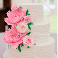 Elegant Wedding Cake Textured buttercream cake with hand made gum paste peonies and roses!