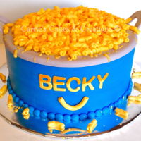 Kraft Mac&cheese Cake Cake is all buttercream, the handles and name are fondant!! Made for a girl who loves Kraft Mac&Cheese!!