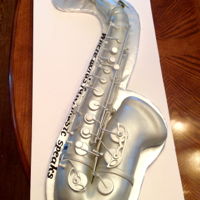 My First Saxophone Fondant covered chocolate cake! My very first saxophone and I LOVE it!! So proud of myself.