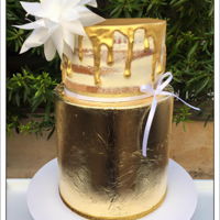 Naked And Gold Birthday Cake I whipped myself up a birthday cake and threw every cake trend I could think of at it. The naked cake is covered with Swiss meringue...