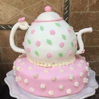 Teapot Birthday Cake Vanilla cake filled with vanilla buttercream covered in pink and white fondant