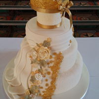 Wedding Cake designed with elements of the wedding gown