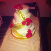 Anniversary Cake vanilla cake, each tier is filled w/ apricot, pineapple and strawberry filling, vanilla buttercream. Fondant roses and draping. painted...