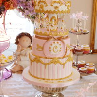 Carousel Cake I made this cake for a christening party. First terier is carrot cake and the second is vanilla sponge cake with lemon curd and buttercream...