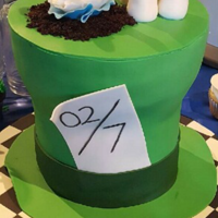 Mad Hatter Made this along with 2 dozen decorated cupcakes for a Alice in Wonderland themed baby shower. The baby's due date is Feb 7th so I...