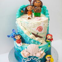 Moana And Company This is a 3 layer 10in + 8in buttercream cake with fondant accents and rtk figurines. Can you see Nemo and Dory hiding?