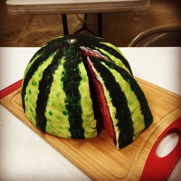Watermelon Cake Watermelon mix cake, covered in fondant and painted with color gel.