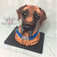 English Mastiff Dog Cake This one was for my son. It's our dog chica....I sculpted her entirely out of cake. I believe I posted a video on my YouTube channel...