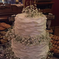 Fondant Ruffled Wedding Cake With Baby's Breathe 8" and 6" tiers of chocolate cake, with chocolate ganache and fondant ruffles