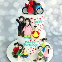 Happy Family This is by far the most number of figurines that I'd ever made to sit on a cake ! 12 figurines all together on this 2 tier cake !! A...