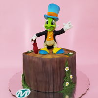 Jiminy Cricket Cake Cake and handmade modelled figure on fondant