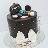 Mac Cake For a makeup lover. Fondant covered cake with fondant and RTK toppers