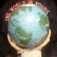The World Is Yours Graduation Cake This world cake is completely round. It is being held up by 2 gum paste and lace hands stating "The World is Yours".....