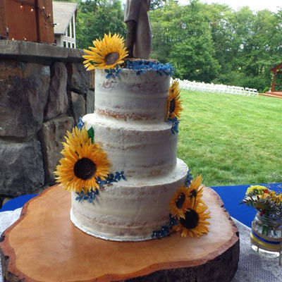 Naked Wedding Cake With Sunflowers