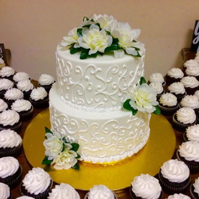 White Scroll Wedding Cake And Cupcakes