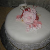 Single Tier Wedding Cake This was made for an informal wedding. The bride is Chinese so I wanted to so I wanted to use gold and red into the colour scheme .