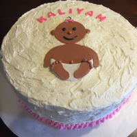 Baby Shower Cake White cake with BC icing and fondant decorations.