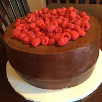 Chocolate Cake With Raspberry Chocolate cake with chocolate ganache and raspberry decorations.