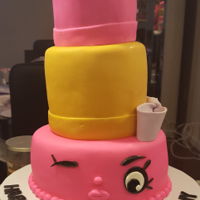 Shopkins Lippy Lips B'day Cake 8inch two layer on the bottom and two tier 6 inch in the middle 4inch rice krispie treat on top. Got this idea from Pintrest.