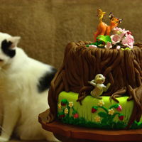 Bambi Cake Bambi cake made with fondant and figurines.
