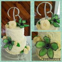 Simple Wedding Cake Yellow cake with lemon buttercream and gum paste flowers