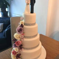 Wedding Cake With Flowers And Figures Wedding cake with flowers and figures