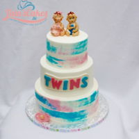 Baby Shower Cake For Twins All 3 tiers arse iced in buttercream. Water color effect. Figures and decorations are MMF.